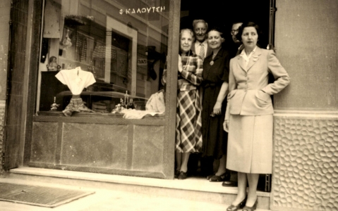 Kaloutsi (centre), her husband George and associates at her first athenian store c.1950.