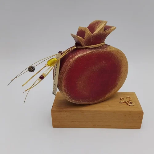 Red wooden pomegranate