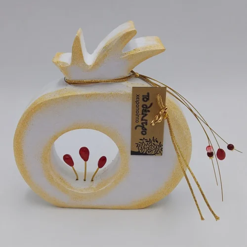 White wooden pomegranate