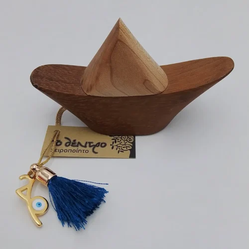 Wooden boat with tassel