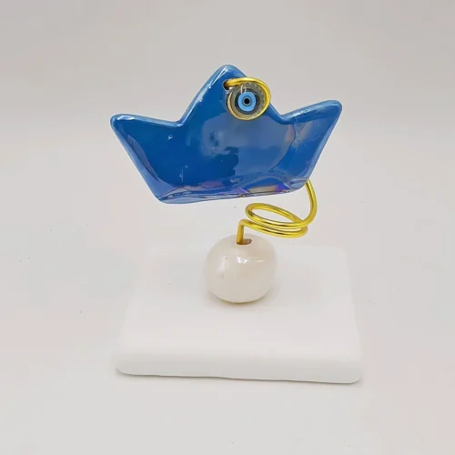 Boat on a marble base