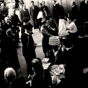 King Paul and queen Frederica visiting the Double Axe stand in the Athens 1949 folk art exhibition. Kaloutsi's daughter, Sissi, shows a tablecloth. King Paul and queen Frederica visiting the Double Axe stand in the Athens 1949 folk art exhibition. Kaloutsi's daughter, Sissi, shows a tablecloth.