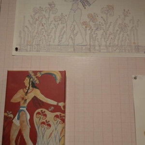 The minoan Prince with lillies designed by Kaloutsi on graf paper. Kaloutsi designed this table using the folk motif in the centre and the preminoan linear decoration at the border.